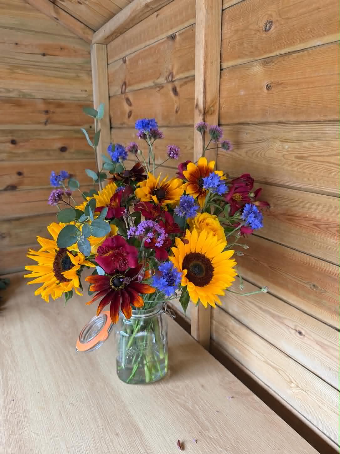 Sunflower posy in a mason jar